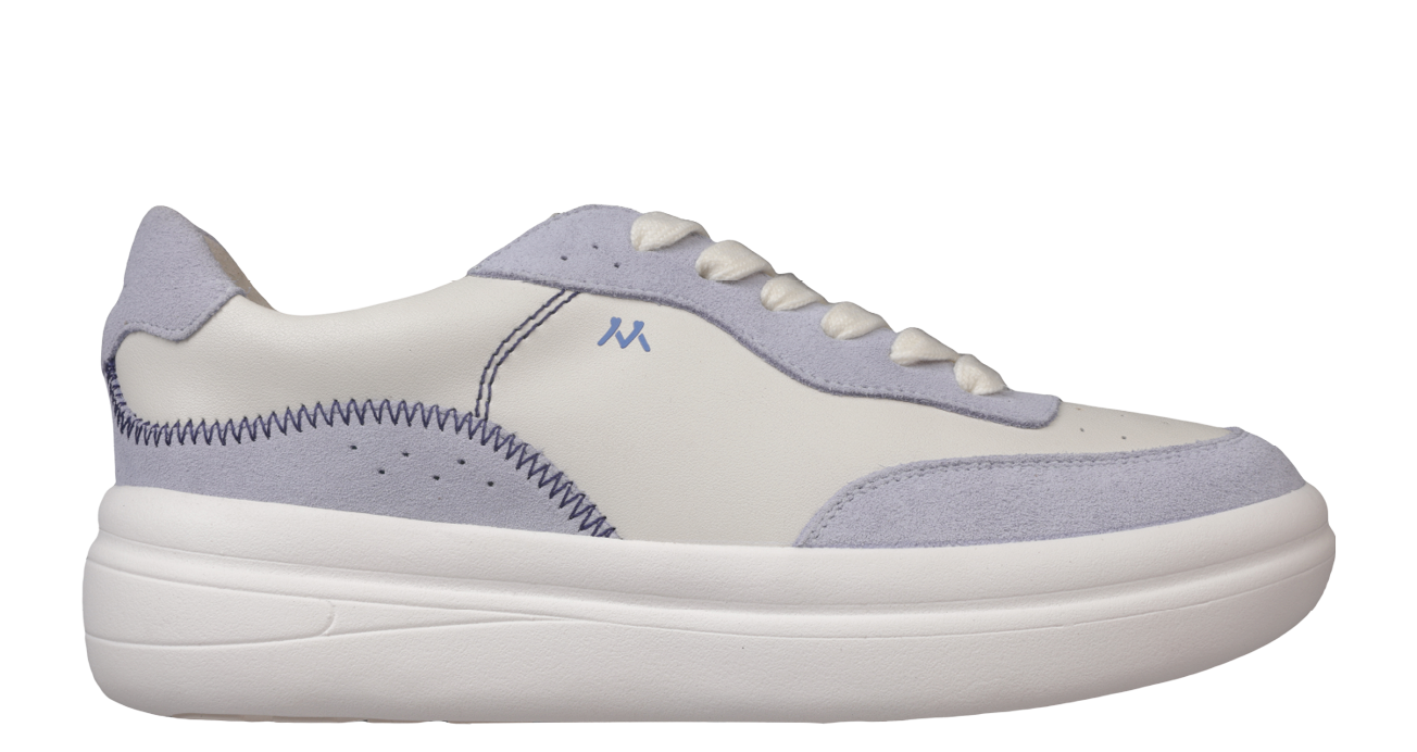 A blue and white shoe with a white sole. Description generated by AI