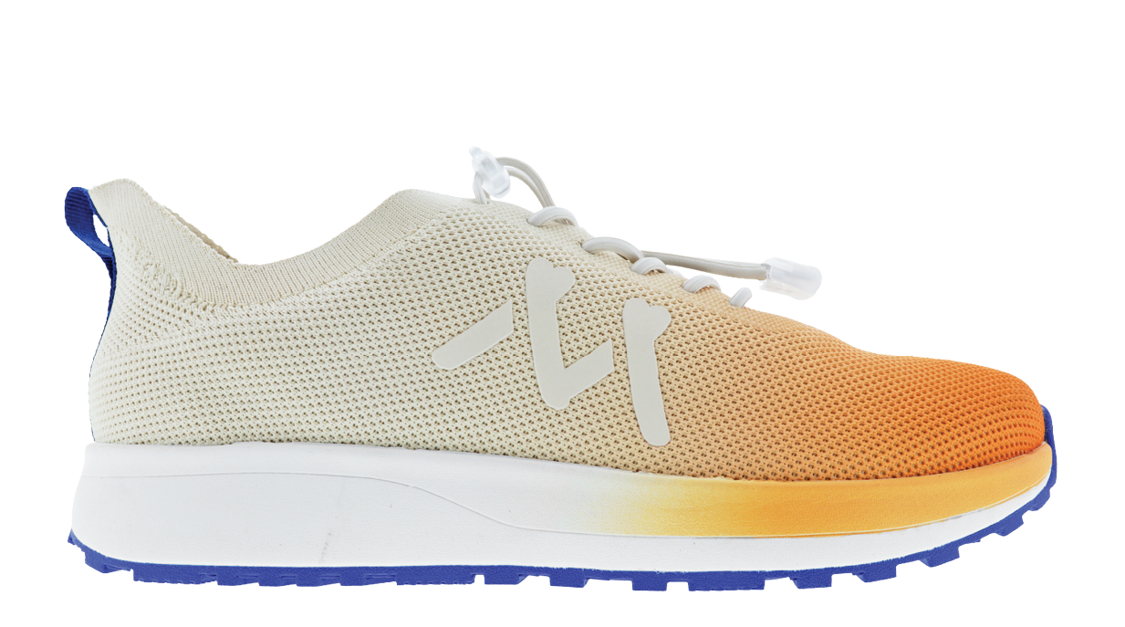 A white and orange shoe with a blue sole. Description generated by AI