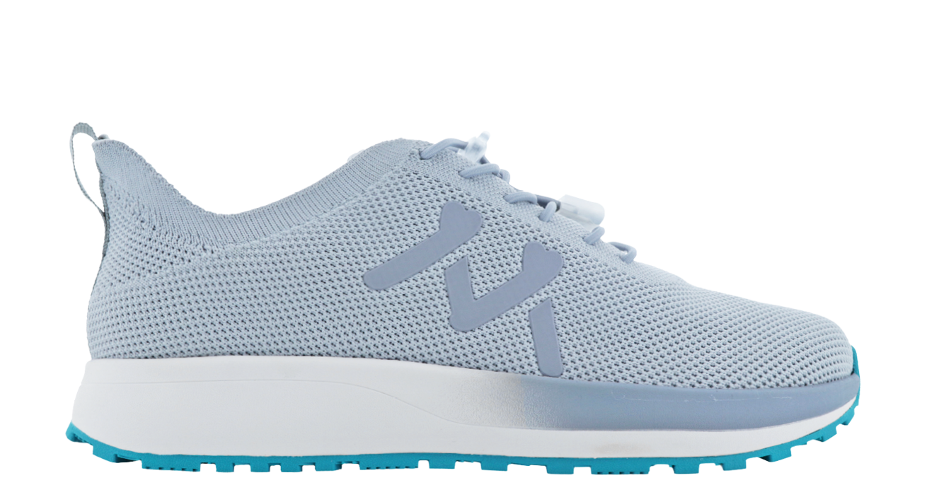 A blue and white shoe with a white sole. Description generated by AI